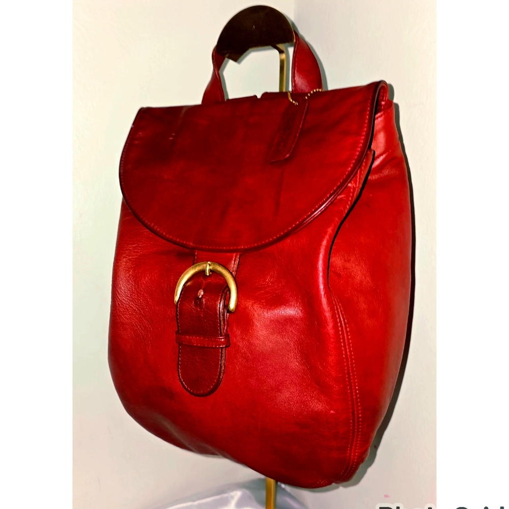 Red Leather Backpack with Gold Buckle and Top Handle